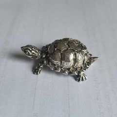 Miniature silver figurine of a turtle