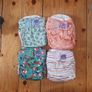 10 bambino mio cloth nappies from birth to 2 years. Velcro fastening, 12 x cloth inserts . All used but plenty of life left. Nappy bag in perfect condition. Image 3