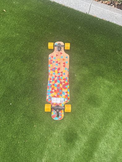 Skateboard with colourful back design
