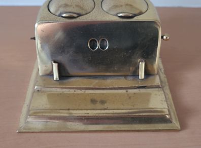 Antique brass inkwell and desk calendar set