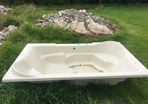 Large rectangular Acrylic bath.