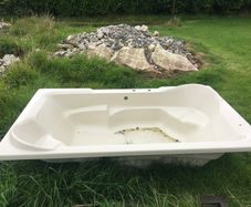 Large rectangular Acrylic bath.