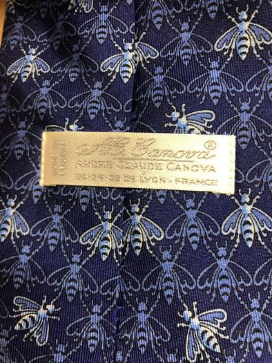 Designer silk tie in blues with bee pattern