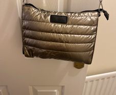 Beautiful gold/Biege  cross over bag