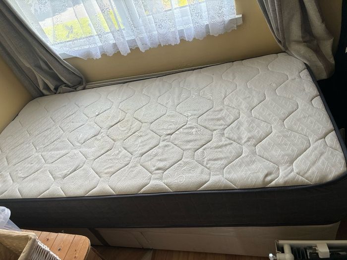 single bed and mattress
