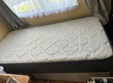single bed and mattress
