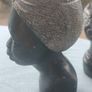 2x Tribal carved stone heads Image 5