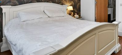Cream wooden Super King Bed