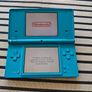 Nintendo DSi handheld console With Super Mario Bros Image 2