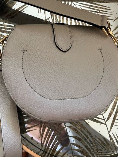 Coccinelle saddle bag . Great condition