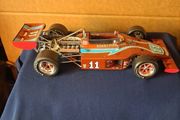Model cars and bar signs