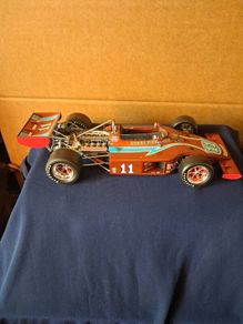 Model cars and bar signs