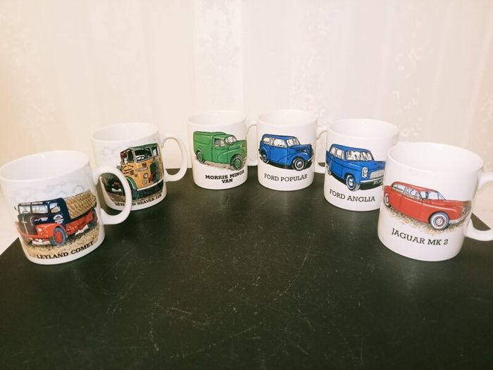 collection of six automotive mugs