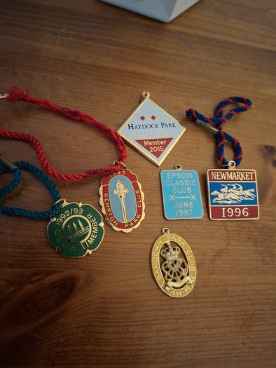 Collection of vintage horse racing member badges