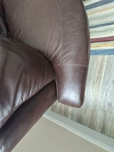 Leather sofa free for collection. There are small scratches on one side from the cat, otherwise it's in great condition.
