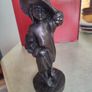 Genesis Sculpture Of A Small Girl Dressing Up With Her Moms Clothes Image 2