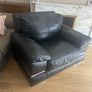 black Leather Armchair featuring plush pillow top arms and chrome accent feet need gone ASAP due to house clearance Image 2