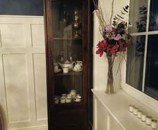 Tall Solid Dark Wood Display Cabinet