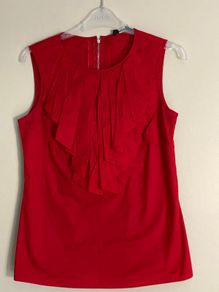 red sleeveless blouse by Oasis