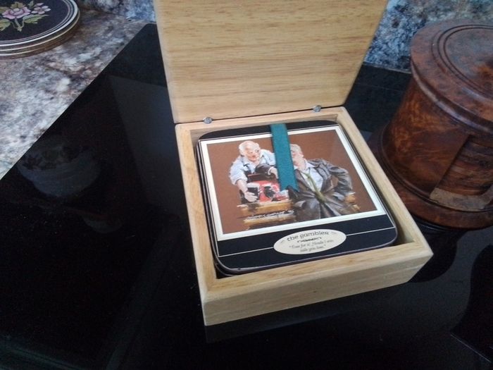 Three sets of Coasters in Containers