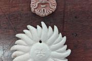 Two Terracotta Faces