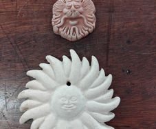 Two Terracotta Faces