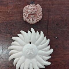 Two Terracotta Faces