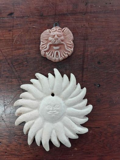 Two Terracotta Faces