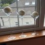 Set of 3 clear glass stemmed candle holders with ivory candles Image 6