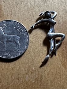 silver broach
