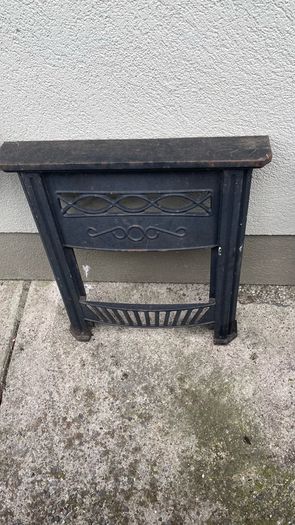 Two cast iron fire surrounds