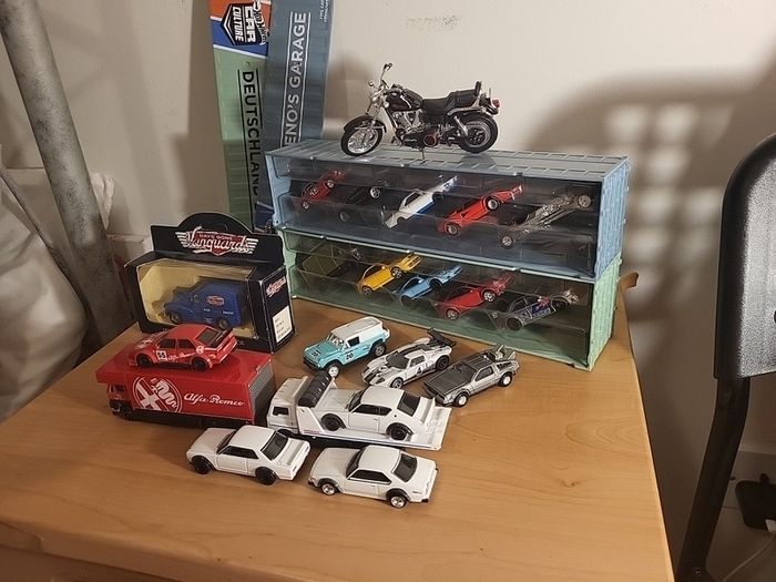 Assortment of diecast, primarily hot wheels premium, but includes a bike and lledo