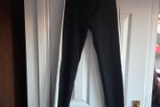 Black skinny trousers featuring contrast white side stripes, size 8
