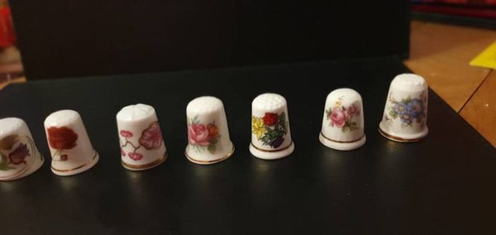 Collection of Flower Themed Gold Coloured Edged Thimbles