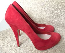 Designer Miu Miu red high heels