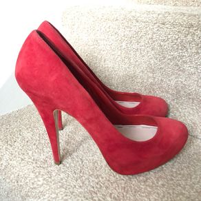 Designer Miu Miu red high heels