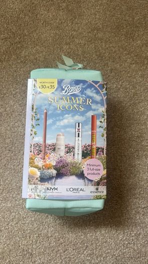 Brand new makeup bag and four brand new products