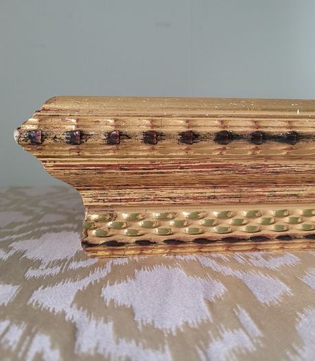 Giltwood mirrored wall shelf