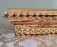 Giltwood mirrored wall shelf