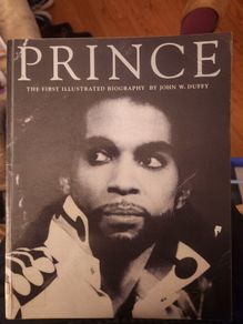 Prince.  The First Illustrated Biography By John Duffy. Large Volume Paperback In Good Condition.