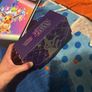 pokemon cards and book and sleeves and game thing Image 5