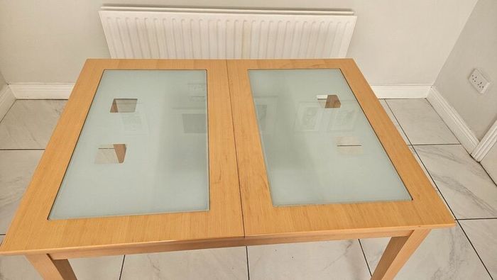 Extendable Light Wood Dining Table with Glass Pane