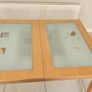 Extendable Light Wood Dining Table with Glass Pane Image 4