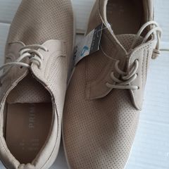 new flat shoes tag attached