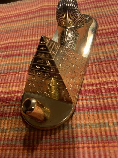 Pyramid pen holder and clock