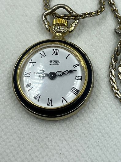 Newton pendant watch