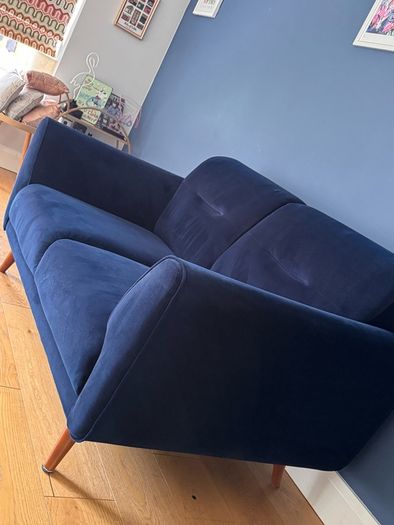 Navy velvet two seater sofa
