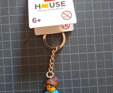 lego house home of the brick key chain