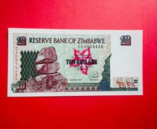 Zimbabwe  10 Dollars  1997  Verified Under Uv Light.  ( Uncirculated )