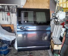 Wv T5 Sliding door  2007 with sliding window  black in coloure